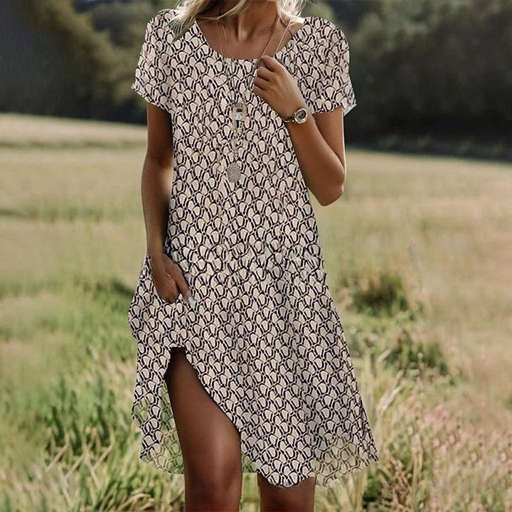 50% kedvezmény【S-3XL】👗2026 új kerek nyakú virágmintás ruha