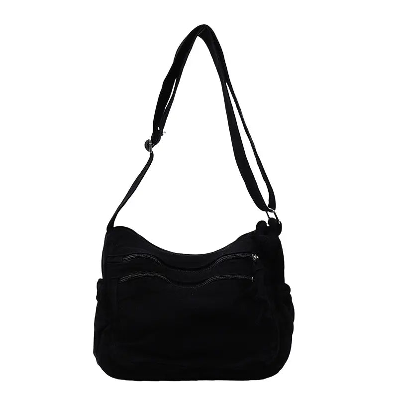 👜✨Prostorná crossbody kabelka z plátna s patinou: vyznačuje se uspořádáním s více přihrádkami na zip a širokým nastavitelným ramenním popruhem.